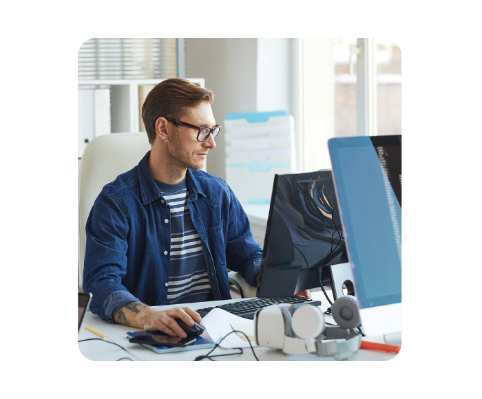 local WordPress developer working in the office, sitting in front of his computer